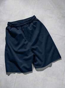 Pantalones cortos deportivos casuales de verano para hombres con corte holgado y estampado gráfico de letra de baloncesto
