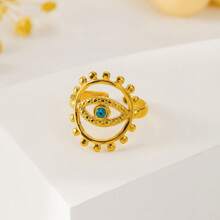 Edelstahl Ring mit goldtonem offenem Ausschnitt und blauem Auge