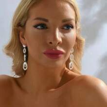 Par de pendientes con colgantes de cristal, elegantes y sensuales, para uso en discoteca, para mujeres
