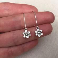 1 paire de boucles d'oreilles pendantes rétro minimalistes vintage argentées en forme de marguerite, bijoux élégants et à la mode pour femmes