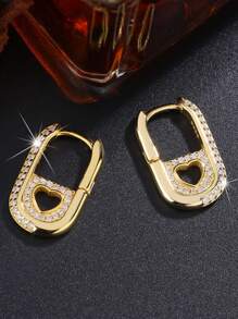 Elegantes pendientes de corazón hueco plateados en plata de ley 925 y oro de 14k, apropiados para que las mujeres los usen en conciertos y fiestas