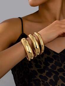 4pcs Gold Tone Chunky Bangle Bracelets, Fashionable Exaggerated Stacking Cuff Wristbands - 4 Smooth Bracelets - View 1