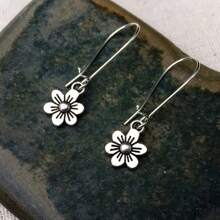 1 paire de boucles d'oreilles pendantes rétro minimalistes vintage argentées en forme de marguerite, bijoux élégants et à la mode pour femmes