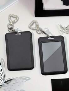 黑色卡包，配有心形吊坠，可用作包包挂饰、钥匙扣，可收纳身份证、会员卡、照片等，具有保护功能，适合日常使用、装饰或作为礼物送给朋友、家人、爱人，也适合情人节、生日、母亲节、返校季等场合。 - 黑色 - 查看 5