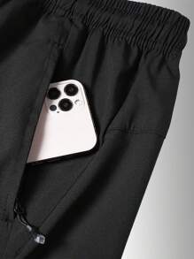 Short d'été ample 1 pièce pour homme, avec poches zippées sur les côtés, cordon de serrage réglable, adapté pour le fitness extérieur et le cyclisme casual