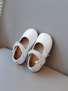Nuevos zapatos planos elegantes para niñas con diseño de lazos de perlas, calzado versátil para uso diario y casual, de fácil puesta y livianos