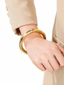 1 pulseira circular vazada de aço inoxidável, disponível nas cores ouro e prata, adequada para uso diário feminino