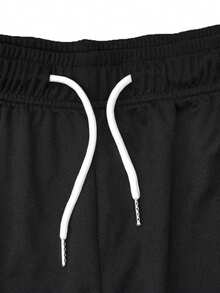 شورتات رياضية كاجوال سريعة الجفاف باللون الأحادي للرجال بخصر مخرم، مناسبة للياقة البدنية والجري وارتداء على الشاطئ - الأسود - مشاهدة 6