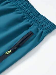 Pantalones cortos sueltos, deportivos y casuales para hombres, de secado rápido, con diseño de tira reflectante, bolsillo, cremallera y cordón en la cintura, adecuados para fitness, correr y actividades al aire libre