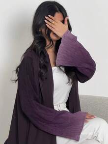 An Elegant Abaya With Patchwork Pleats And Pleated Cuff Open Front, Showcasing Fashion And Softness, Presenting An Elegant And Refined Style.