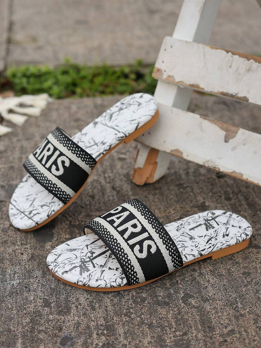 2025夏季时尚简约刺绣字母男女童拖鞋水墨画风格休闲度假沙滩拖鞋 - 黑與白 - 查看 1