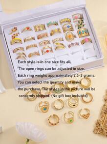 16 piezas de anillos de acero inoxidable de color amarillo dorado con apertura ajustable y decoración de color, apropiados para decoración diaria o regalo. El patrón y el color se enviarán de forma aleatoria.