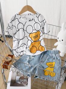 Set de 2 piezas de camiseta de manga corta con cuello redondo y estampado de oso, y pantalones cortos con efecto de mezclilla desgastada con estampado de oso para niños pequeños, estilo casual y elegante, para primavera y verano