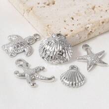 5 Stücke Edelstahl Ozean Themen Anhänger Sortiment - Seestern, Muschel, Schildkröte, Hai, Fisch, Delfin, Seepferdchen. Geeignet für Armband, Halskette, Knöchel, Ohrring Schmuck DIY, Vintage, Strand, Party Elemente, 18 Karat vergoldet