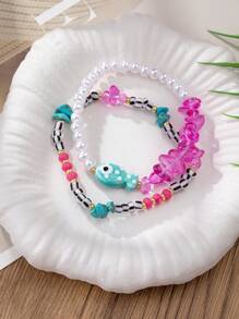 Set de 2 pulseras bohemias con cuentas para mujeres con dije de pez, hechas a mano de cerámica con agrietamiento y defectos normales, joyería de estilo vacacional