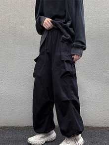 Pantalón paracaidista impermeable de secado rápido y corte holgado Multibolsillos Cintura con cordón Adecuado para actividades de ocio al aire libre - Negro - Ver 4