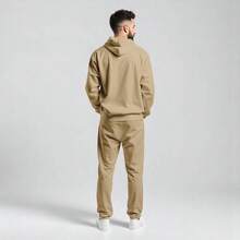 CONJUNTO CASUAL TIPO DEPORTIVO 2 PIEZAS, SUDADERA CON CAPUCHA Y PANTALON CON JARETA O CIERRE PARA HOMBRE - Beis - Ver 2