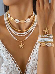 Un nuevo conjunto de 5 collares, 7 pulseras y 7 tobillos con cuentas de conchas y estilo bohemio de vacaciones, con colgantes de estrella de mar y combinación de cuentas de arcilla polimérica, adecuado para el uso diario de la mujer