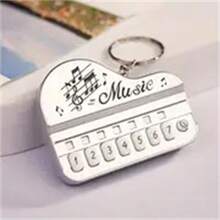 1 pieza Piano electrónico en miniatura con llavero, adecuado para aliviar la presión de los dedos, entretenimiento, práctica de interpretación, el mejor regalo para la felicidad