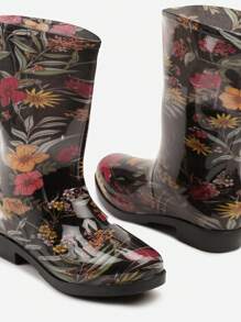 Gummistiefel mit bunten Blumen und Blättern