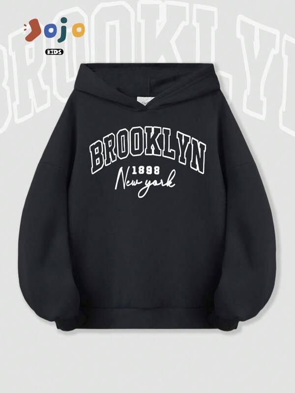 Neuer Vintage minimalistischer Jungen Oversized Loose Drop Shoulder weicher, bequemer Lässig Hoodie Sweatshirt für den Frühling, grafischer Buchstaben- und Stadtname-Muster, stilvoller Streetwear-Oberteile