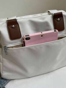 In 2025, The New Fashion Classic Joker Solid Color Large-Capacity Multi-Pocket Contrasting Hand Bill Of Lading Design Leisure Canvas Messenger Bag Is Suitable For Traveling On Campus.