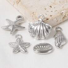 5 Stücke Edelstahl Ozean Themen Anhänger Sortiment - Seestern, Muschel, Schildkröte, Hai, Fisch, Delfin, Seepferdchen. Geeignet für Armband, Halskette, Knöchel, Ohrring Schmuck DIY, Vintage, Strand, Party Elemente, 18 Karat vergoldet