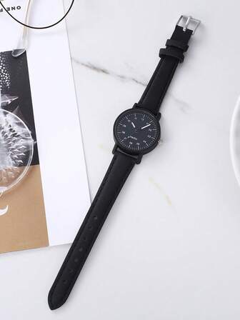 女士黑色手錶,配有阿拉伯數字和標記