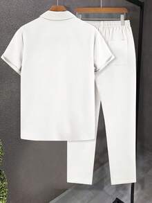 男士休闲两件套，夏季短袖树脂纽扣领衬衫搭配抽绳长裤，质感涤纶面料，双口袋+独特Logo，经典纯色