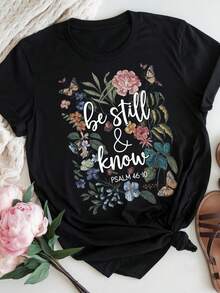 Camiseta con Estampado Floral de Mariposas para Mujer - Diseño "Be Still & Know", Camiseta de Manga Corta con Cuello Redondo Transpirable, Suave y Elegante para Primavera y Verano, Camisa de Mariposa - Premium 180g Blac - Negro - Ver 1