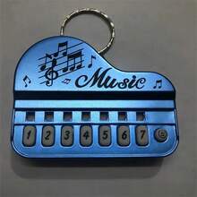 1 pieza Piano electrónico en miniatura con llavero, adecuado para aliviar la presión de los dedos, entretenimiento, práctica de interpretación, el mejor regalo para la felicidad
