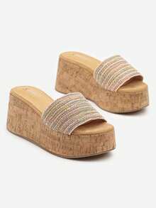 Keilsandalen mit geflochtenem Obermaterial verziert