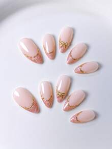 10pcs Handmade French Short Nail Stickers. This Nail Art Set Includes 5 Colors: White, Pink, Gold, Blue, And Yellow, With A Charming And Adorable Design. Each Nail Sticker Is Decorated With Hand-Painted Vine Patterns That Wind Along The Metallic French Edge, And Are Embellished With Gold And Diamond Bow Accents. - Pink - View 5