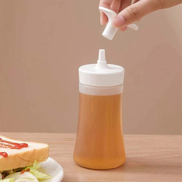 Frasco invertido para ketchup, molho para salada, recipiente para condimentos de cozinha e dispensador de boca grande. Algumas pequenas manchas pretas podem ocorrer durante a produção, mas não afetam o uso normal. Sinta-se à vontade para comprar.