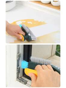1件家用多功能缝隙刷，浴室刷，地板缝隙刷，刮刀刷一体式浴室角落缝隙马桶清洁刷。