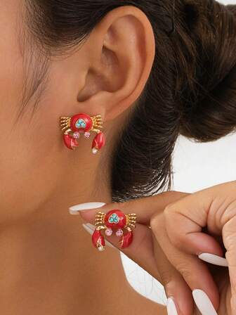 1 par de pendientes con forma de cangrejo, joyería delicada y elegante adecuada para el uso casual y artístico elegante de las mujeres