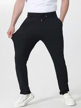 1 pièce Pantalon casual de couleur unie à taille élastique pour hommes, léger pour l'été, en tissu soyeux, pour un usage quotidien, extérieur, voyages et sports