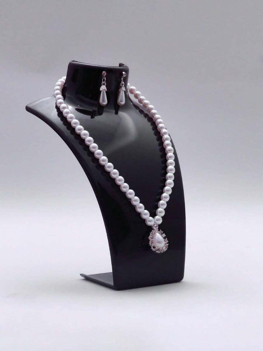 1 قطعة حامل عرض مجوهرات أنيق للعقود والقلادات والأقراط - منظم مثالي لهدايا عيد الميلاد والشكر وراس السنة والعيد - تصميم نصفي أنيق لعرض إكسسواراتك - مثالي لديكور المنزل وعرض البيع بالتجزئة والمناسبات الخاصة - عزز مجموعة مجوهراتك بهذا الحل التخزيني الأنيق والوظيفي - ضروري لعشاق الموضة وباحثي الهدايا على حد سواء - ارتق بلعبة إكسسواراتك هذا الموسم العطلات بقطعة عرض رائعة، ديكور الغرفة - الأسود - مشاهدة 1