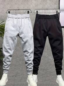 Pantalones deportivos de 2 piezas para hombre, para correr y actividades al aire libre, de unicolor y diseño simple, con cintura elástica y cordón, disponible en varios colores, aptos para todas las estaciones, adecuados como regalo para esposos, novios, jóvenes y amigos que les gusta hacer deporte y estar en forma.