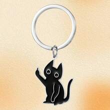 1 pieza Llavero de gato de aleación de zinc, colgante de acero inoxidable de gato negro de dibujos animados con dedo medio, versátil