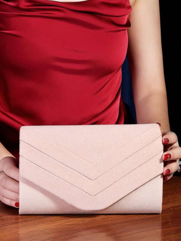 This Clutch Bag Features A Simple Envelope-Style Design, With Easy Open And Close Functionality. It Can Easily Accommodate Small Personal Items Like A Phone, Lipstick, Cards, And Cash To Meet Basic Storage Needs. From The Usage Perspective, The Light Pink Color Exudes A Gentle Elegance, While The V-Shaped Decorative Lines Add A Fashionable Touch