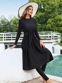 Costume da bagno tutta copertura a due pezzi in maglia tinta unita, con maniche lunghe e pantaloni lunghi, adatto come abbigliamento da spiaggia e resort, disponibile in taglie comode