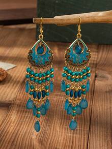 1 Đôi bông tai phong cách Bohemian cổ điển, được trang trí bằng các họa tiết chạm khắc và chi tiết giọt dầu, tua rua hình giọt nước làm từ hạt cườm. Thích hợp cho phụ nữ đeo trong các lễ hội và dịp kỷ niệm. - Đỏ - Xem 14