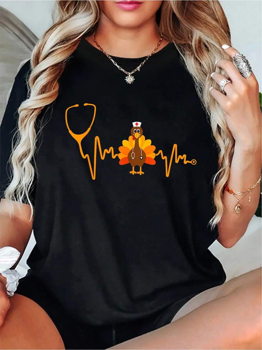 Camiseta para mujer con estampado de estetoscopio de pavo de enfermera de Acción de Gracias, algodón pesado de 180 g, camiseta negra de manga corta con cuello redondo, top informal con gráfico divertido de vacaciones, ropa cómoda y suave de pavo de enfermera de Acción de Gracias - Negro - Ver 1