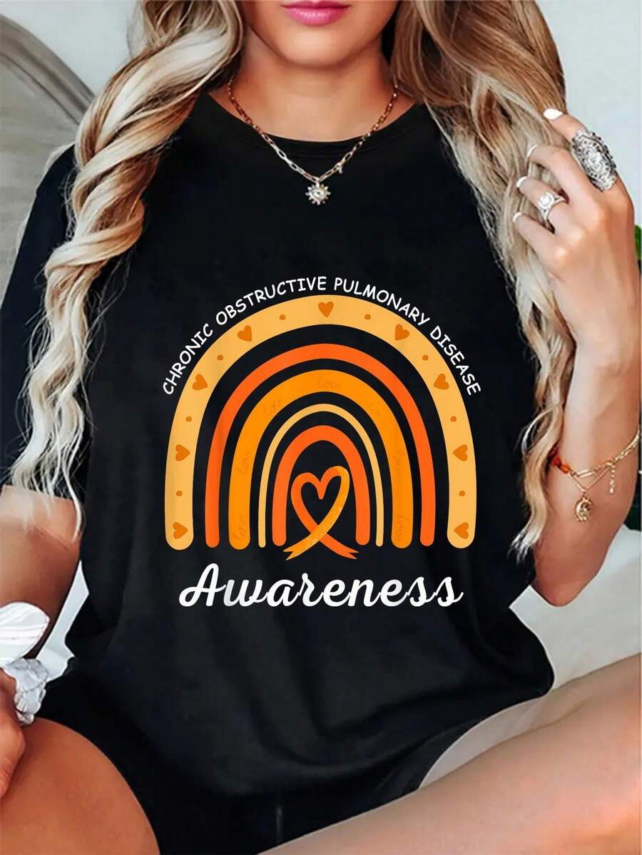 Camiseta estampada de manga corta y cuello redondo de algodón negro de 180 g para mujer para la concientización sobre la enfermedad pulmonar obstructiva crónica con diseño de cinta de corazón arcoíris - Negro - Ver 1