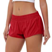 Pantalones cortos deportivos de tiro bajo para mujer: ligeros, de secado rápido, con bolsillo con cremallera y forro interior para correr, yoga y gimnasio. - Rojo - Ver 1