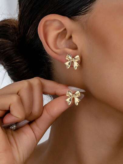 1 Pair Of Geometric Fashion Elegant Women Simple Bow Earrings Elegant Women Daily Clothing Jewelry Accessories, Christmas Golden Bow Earrings, Christmas Bow New Year Holiday Gifts.Fashion Summer Travel Beach Party Jewelry Ear Studs Earrings.