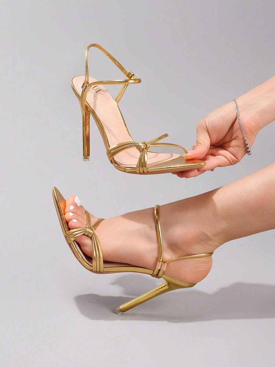 Giày sandal cao gót màu vàng ánh kim dành cho nữ, kiểu dáng thanh lịch và gợi cảm, mũi nhọn, thích hợp cho các buổi tiệc tối trang trọng, phù hợp với trang phục mùa xuân hè.