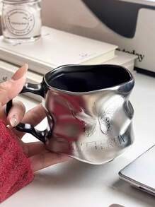 This Dark Butterfly Style Cup Has A Unique Design. With A Dark Tone, The Cup Body Features A Butterfly Relief, Embodying The Aesthetic Of Dark Beauty. The Material May Be Ceramic, Processed To Have A Metallic Luster. The Asymmetrical Cup Body Is Paired With A Curved Handle, Balancing Artistic Appeal And Comfortable Grip. Can Be Used As A Daily Drinkware Or Home Decor. Back To School