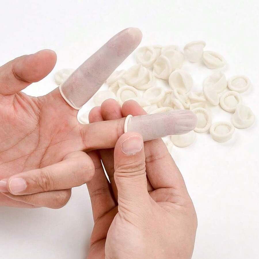 100 piezas de dedales de látex de tamaño mediano, anti-estáticos, para proteger los dedos y mantenerlos secos y limpios. Guantes desechables de dedo de color blanco. - Dedales de goma - Ver 1